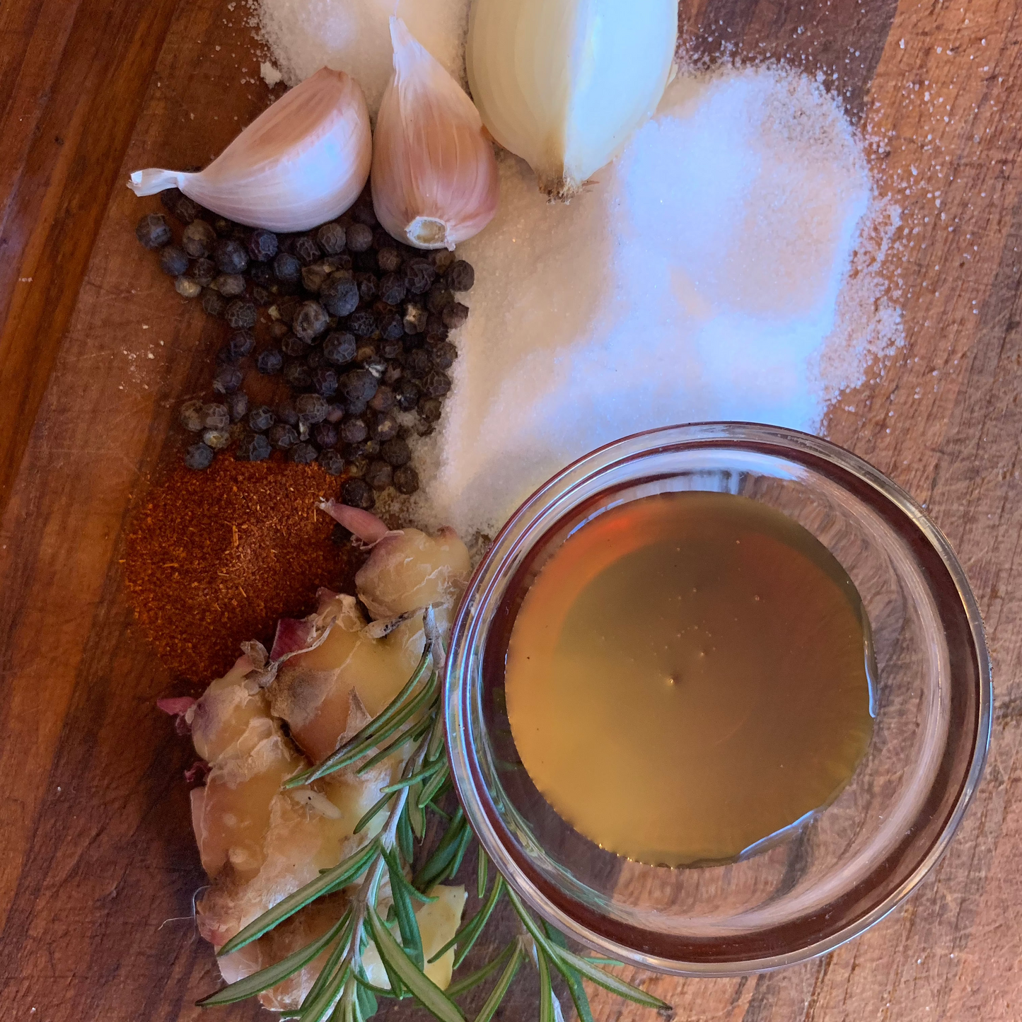 Busted Butt seasoning raw ingredients on cutting board.