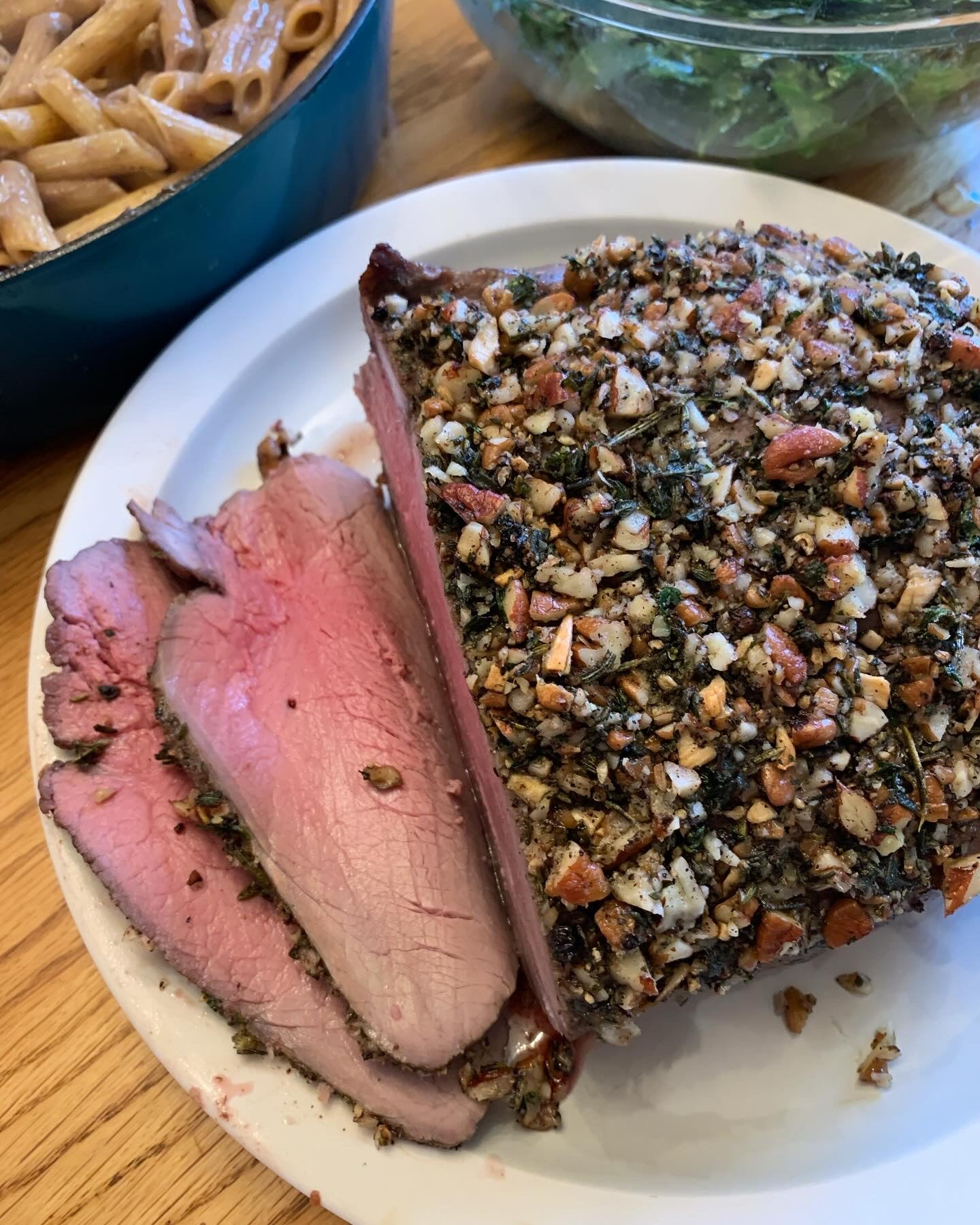 Herb and pecan crusted top round beef roast cooked to perfection.